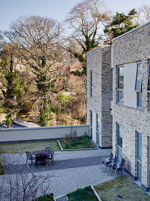 Exterior view and outdoor seating Maryfield Nursing Home Healthcare Architecture by OCMA